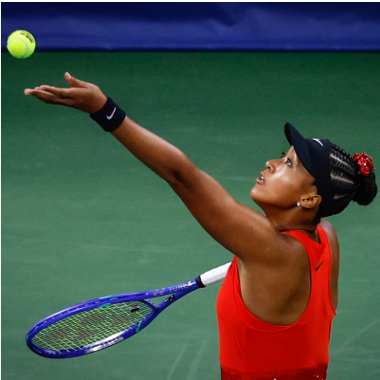 Young tennis player preparing to serve